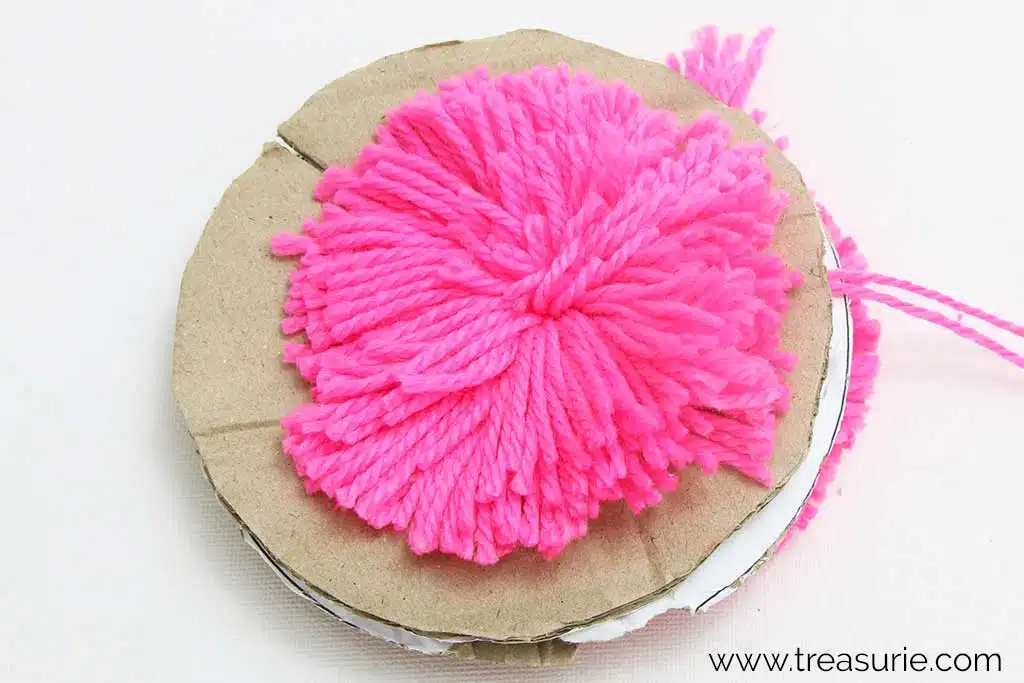 Tie Center of Pom Pom