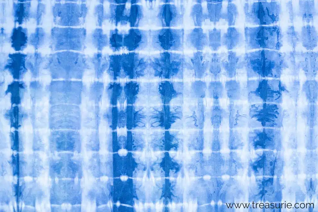 shibori tie dye pattern in blue and white fabric