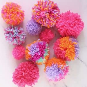 DIY pom poms and how to make a pom pom featured image